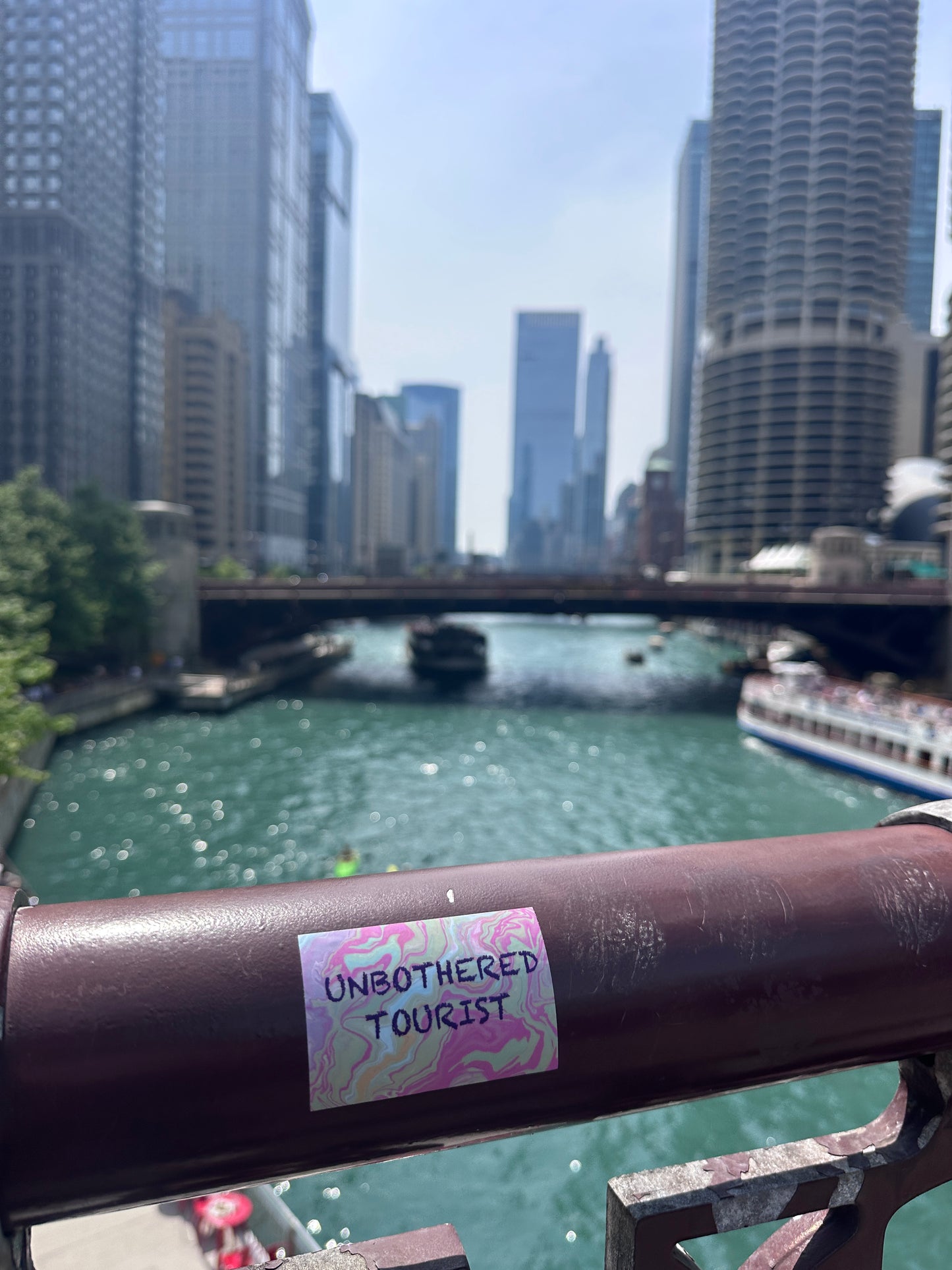 Unbothered Tourist sticker (5 pack)