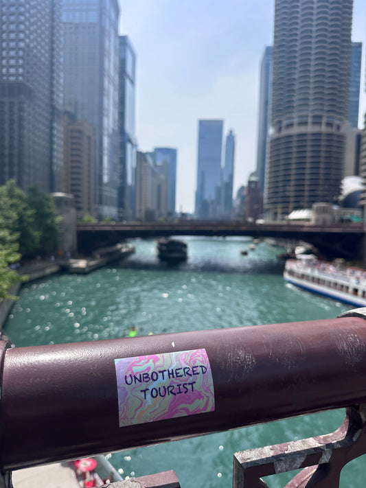Unbothered Tourist sticker (5 pack)