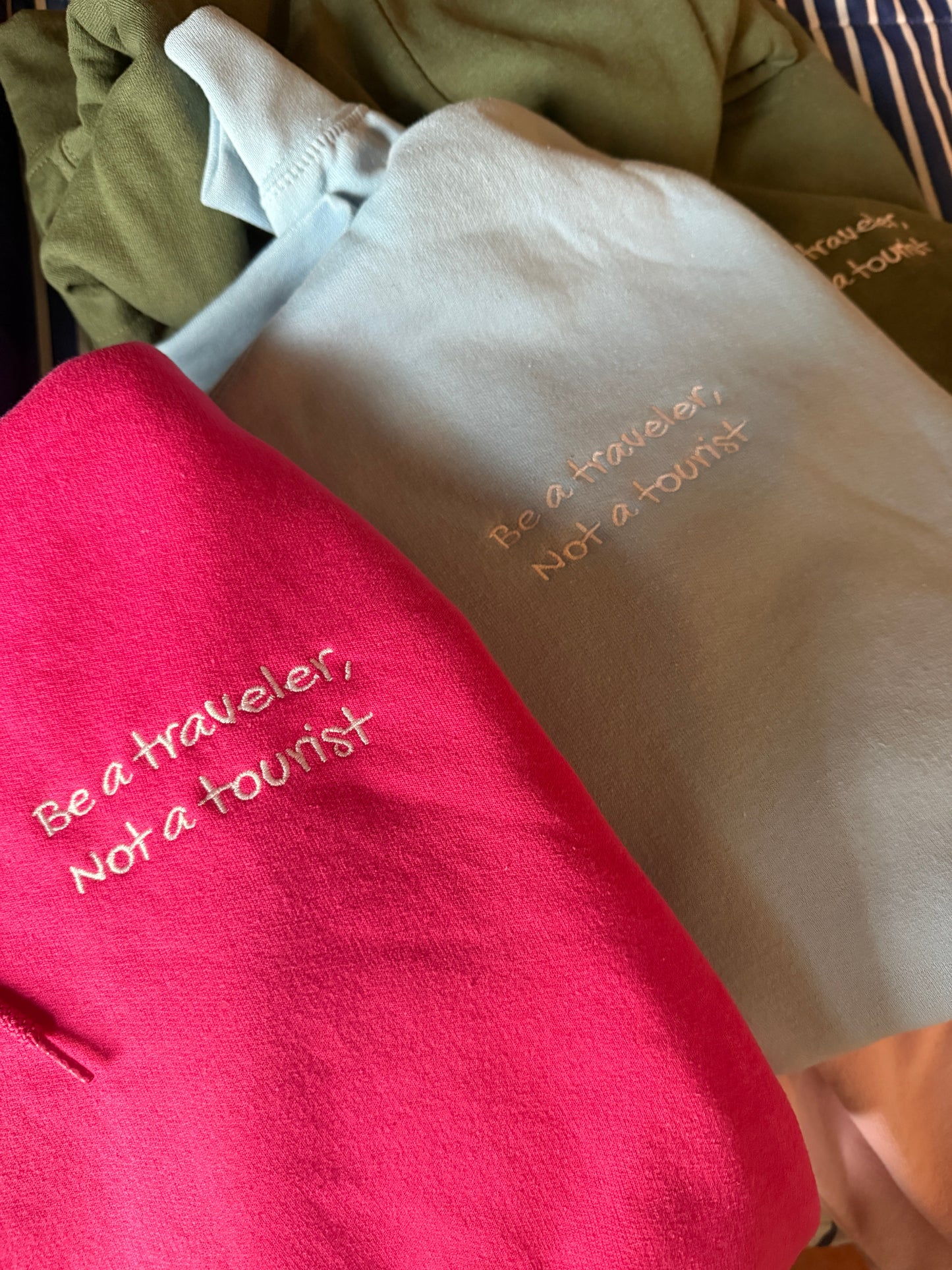 “Be a Traveler, Not a Tourist” hoodie