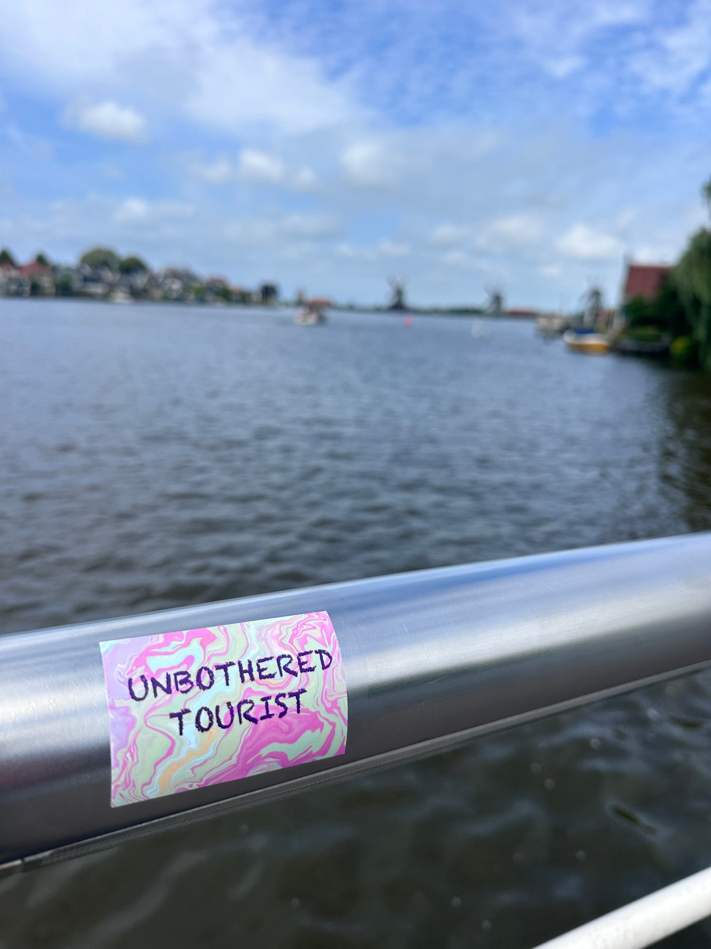 Unbothered Tourist sticker (5 pack)